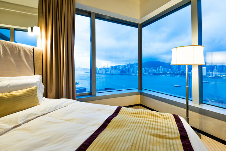 Comfortable bed beside the window.